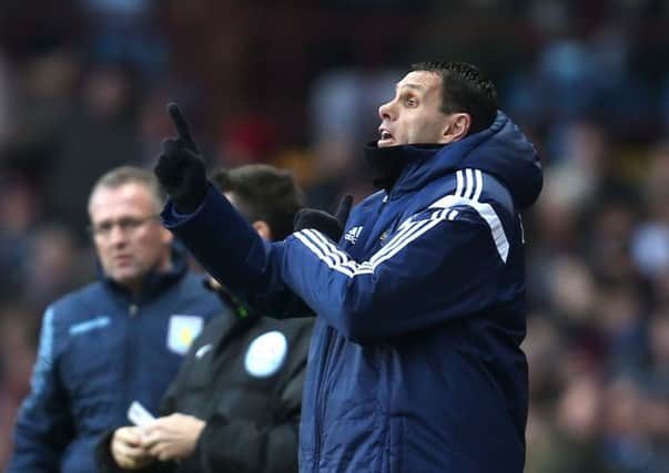 Sunderland manager Gustavo Poyet gives instructions from the touchline during the Barclays Premier League match at Villa Park
