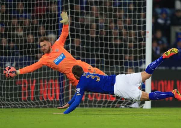 Leicester City's Chris Wood sees his diving header saved by Newcastle United's keeper Jak Alnwick during the FA Cup Third Round match at the King Power Stadium