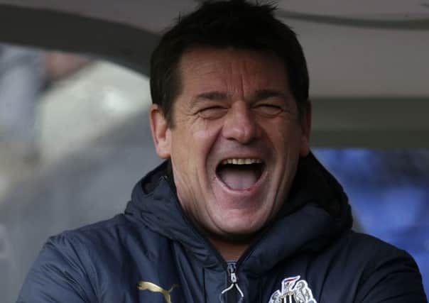 Newcastle United manager John Carver reacts during the Barclays Premier League match at the KC Stadium, Hull
