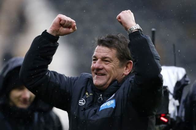 IN CHARGE ... John Carver.