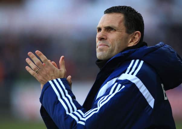 Sunderland manager Gustavo Poyet during the Barclays Premier League match at The Liberty Stadium