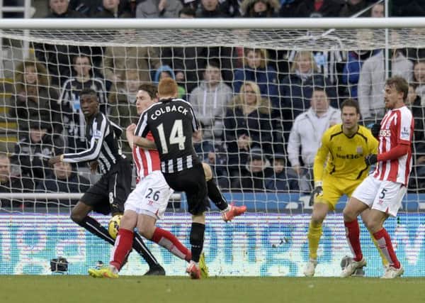 Newcastle United's Jack Colback (centre) scores their first goal of the game during the Barclays Premier League match at St James's  Park