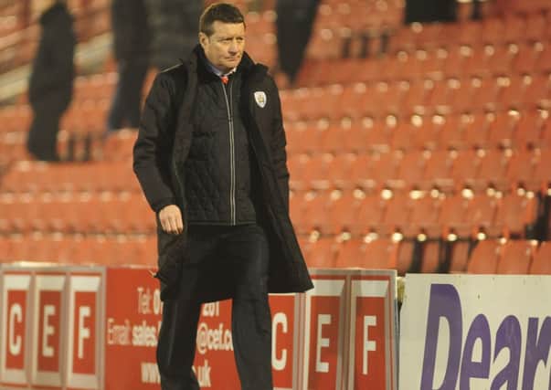 HIS FINAL WALK: Barnsley manager Danny Wilson at the final whistle of Tuesday night's home defeat by Fleetwood