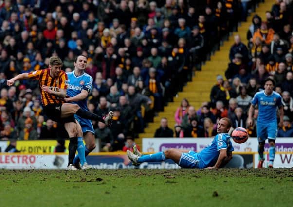 Bradford City's Jon Stead score his side's second goal during the FA Cup Fifth Round match at the Valley Parade.