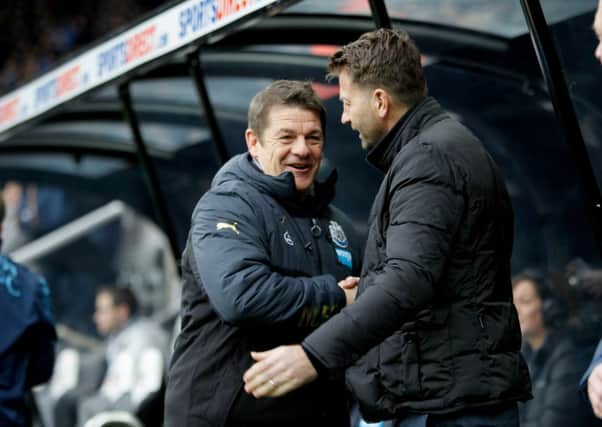 Newcastle United  manager John Carver (left) and Aston Villa manager Tim Sherwood (right)