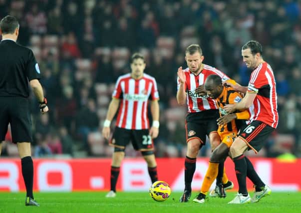 Lee Cattermole and John O'Shea in action for Sunderland against Hull City. Picture by FRANK REID