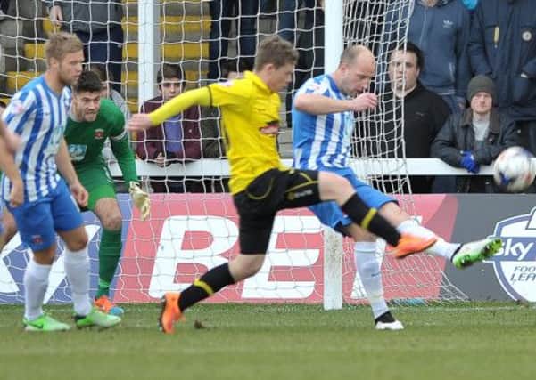 DEFENDING WELL: David Mirfin in action for Hartlepool United against Burton Albion. Picture by FRANK REID