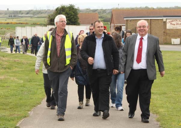 From left,  Niall Benson, Heritage Coast officer,  Coun Stephen Akers- Belcher, Ceremonial Mayor of Hartlepool, John Robinson, Chairman of Durham County Council,  lead walkers towards the finish of the first Walk4Life through Coast and Country.