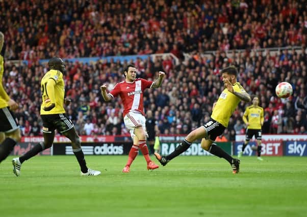 GET IN: Middlesbrough's Lee Tomlin scores his team's first goal against Brentford