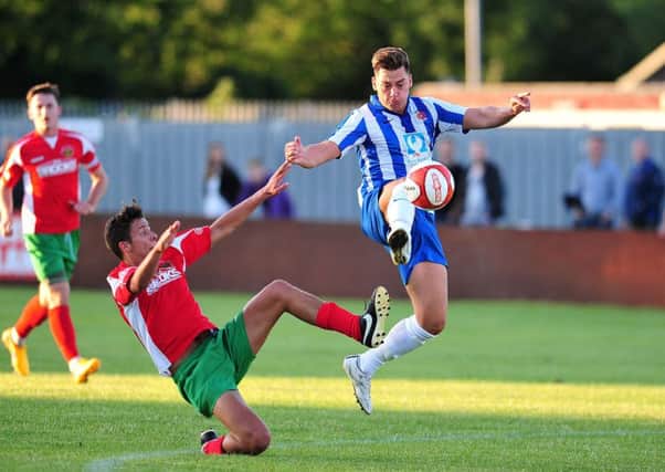 Scott Fenwick scores for Hartlepool United during their 2-0 victory at Harrogate Railway. Picture by FRANK REID