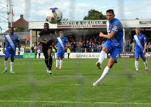 Billy Paynter scores from the penalty spot for Hartlepool United against Carlisle United. Picture by TOM COLLINS