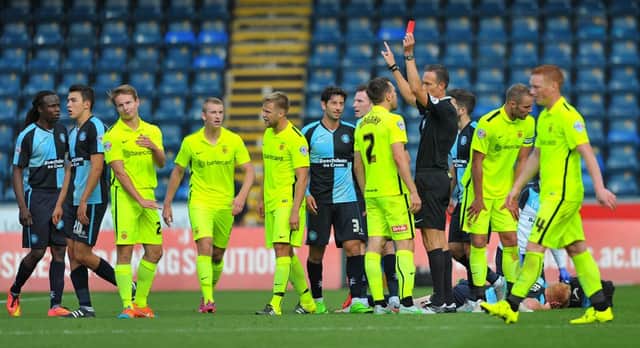 Carl Magnay is sent off during the second half against Wycombe Wanderers.  Picture by FRANK REID