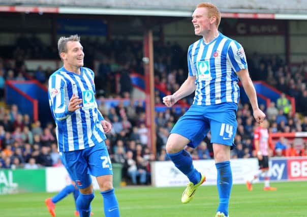 Michael Woods celebrates scoring his first goal for Pools against Exeter City. Picture by FRANK REID