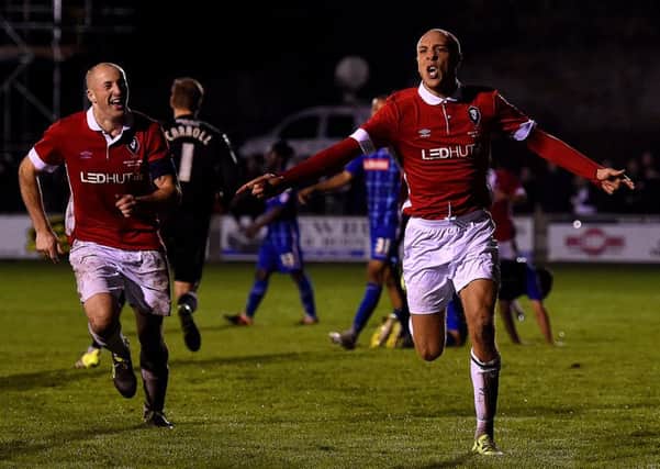 Salford City's Richie Allen celebrates scoring his side's second goal of the game against Notts County