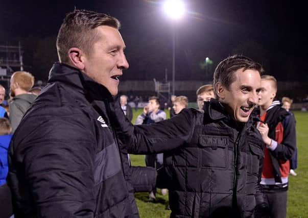 Gary Neville (right) with Salford City's co-manager Anthony Johnson