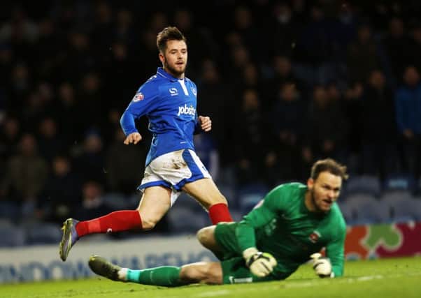 Portsmouth's Marc McNulty scores the final Pompey goal
