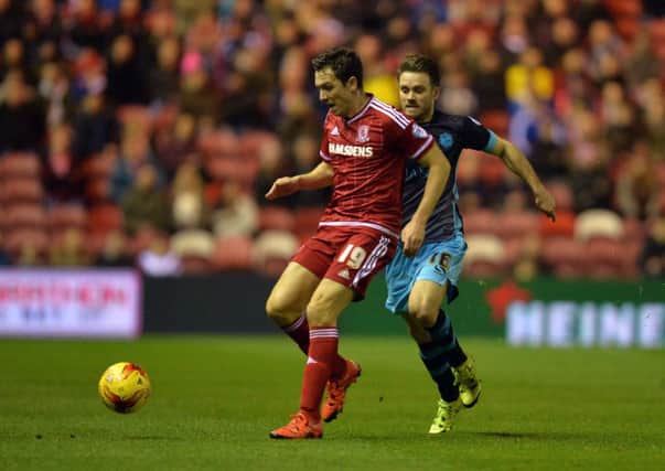 Middlesbrough's Stewart Dowing battles for the ball with Sheffield Wednesday's Rhoys Wiggins