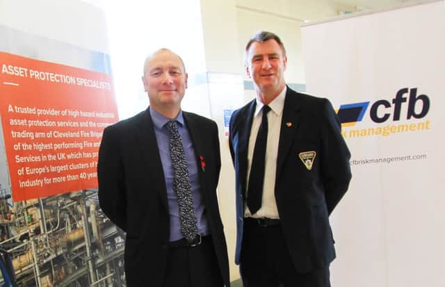 Darren Hankey (left) Principal, Hartlepool College of Further Education, with Ian Hayton, Managing Director, CFB Risk Management.