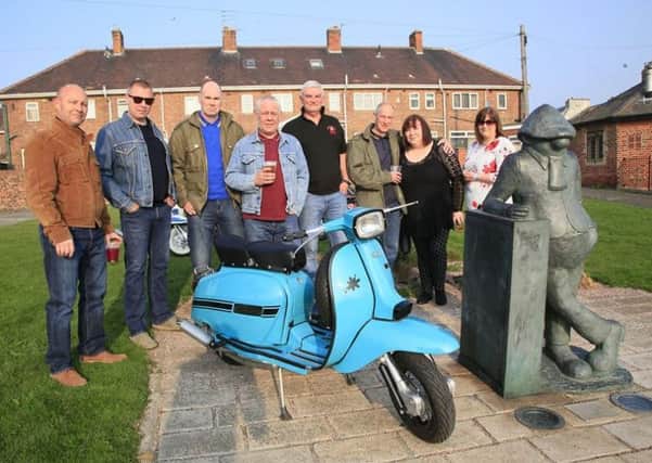 The Hartlepool March of the Mods team with last years scooter winner Bruce Macpherson.