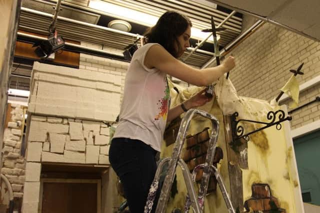 PDSS student Molly putting the finishing touches to the Hartlepool street