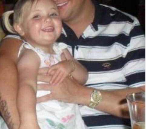 Scott Fletcher with his daughter.