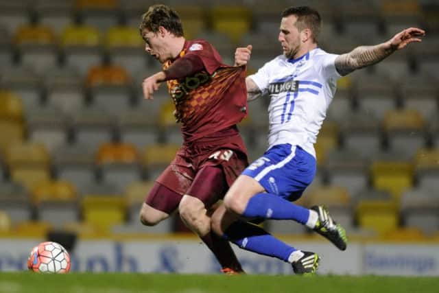 Luke James in action for 
Bradford City against Bury in the FA Cup Third Round Replay