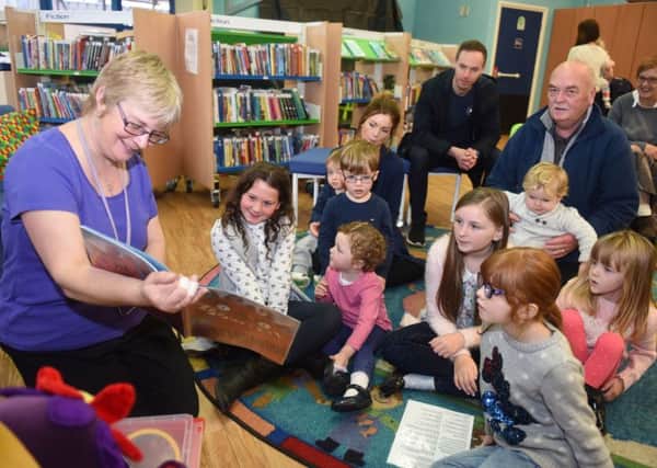 Joanna Bellerby reading for children at Hartlepool Central Library on Thursdya as part of a holiday activity session.