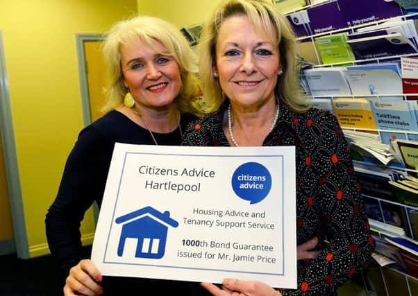 Angela Brough (left) and Beverley Goodwin from Citizens Advice Centre with the 1000th housing bond. Picture by FRANK REID