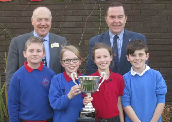 Throston Primary School pupils with the Ian Cameron Memorial Trophy given to them by Hartlepool Rotary Club.