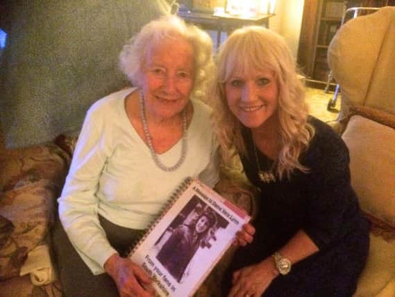 Dame Vera Lynn with tribute act Lorrie Brown.