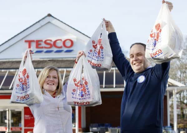 Tesco's Jill Telfer and Peter Leatherby at the launch of the Bags of Help initiative.