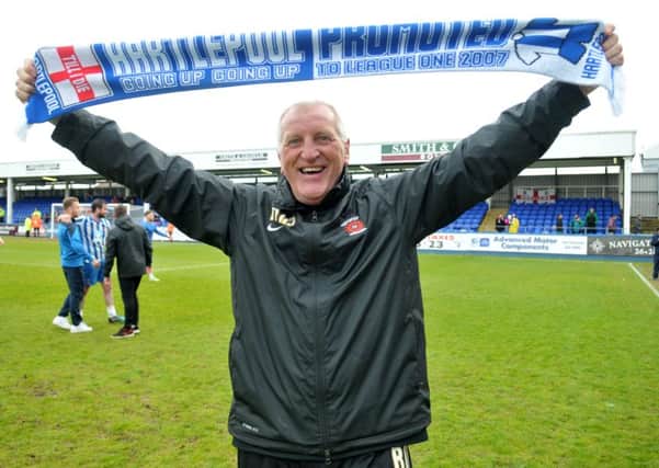 Hartlepool United manager Ronnie Moore celebrates at the end of the lap of honour for Pools after the 2-1 win over Exeter City which saw Pools retain their Football League status last season. Picture by Frank Reid