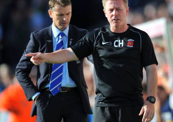 Colin Cooper and Craig Hignett on the sidelines during the game against Bristol Rovers in 2013. Picture by FRANK REID