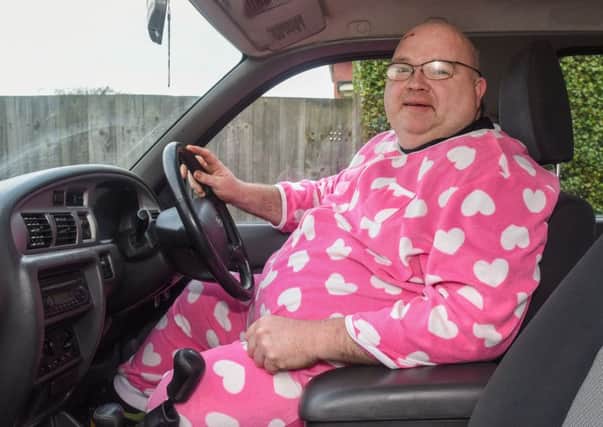 Tony Mann in the onesie he will be wearing for the drive in a day from Lands End to John oGroats.