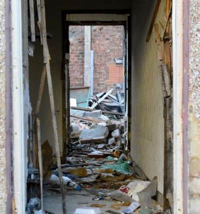A total of 34 empty properties are being cleared to make way for the new development.