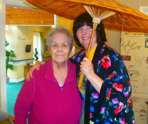 Resident Helena Right with activities coordinator Janice Hardy.