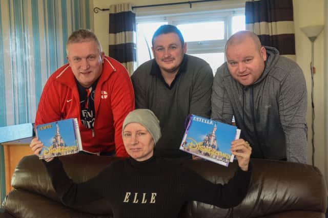 Steffi Timms, of Windemere Road, Hartlepool who has been given 12 months to live is off to Disneyland Paris with her famil after Miles for Men stepped.Pictured with Steffi are husband Steve (centre) and Kevin Hill (left) and Michael Day from Miles for Men.