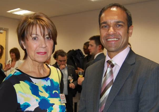 Judith Robinson with Vipul Patel who is also involved in the Gus Robinson Foundation.
