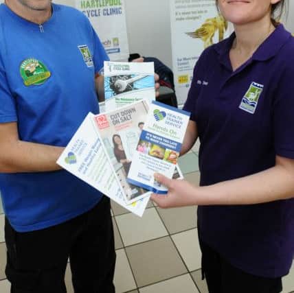 Keith Carter (Summerhill) and Faye Guy (health trainer) with a selection of information leaflets. Picture by FRANK REID