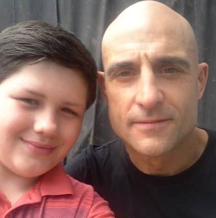 Nathan Jukes on the set of Grimsby with Mark Strong.