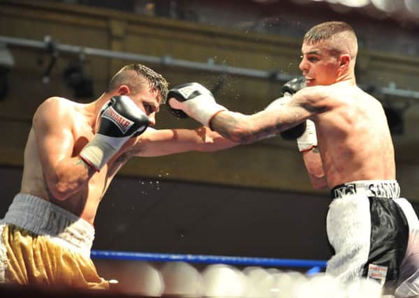 Jordan Ellison, left, goes on the attack in a recent bout against Lewis Ritson.