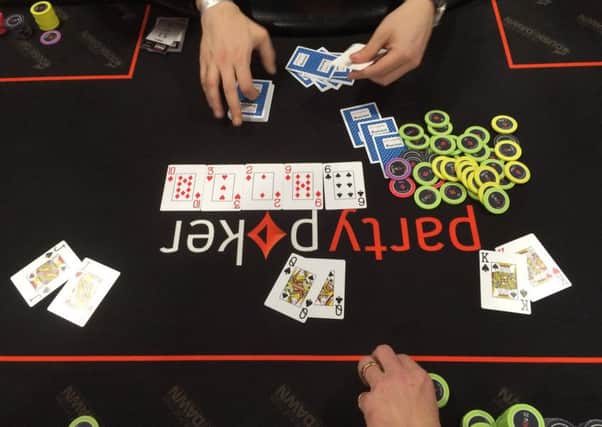 A hand at the Grand Prix Poker Tour at Newcastles St Jamess Park.