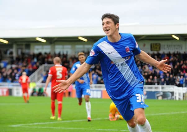 Jake Gray celebrates after scoring in Pools' 3-1 win over Leyton Orient