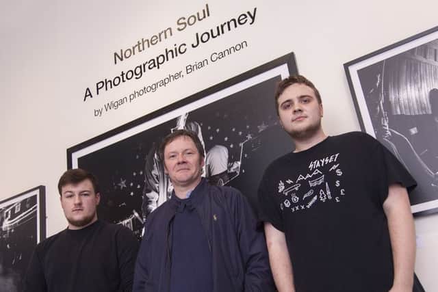 From left to right;  Grant Hegedus, Brian Cannon and Harry Garrens take a look at the Northern Soul exhibition after the lecture at CCAD
