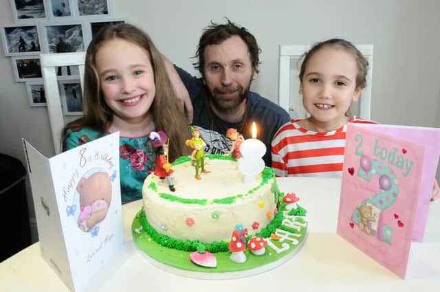 Lara Stewart (left) who celebrated her 8th Birthday on 29th February with her Dad Ellis and sister Isla. Picture by FRANK REID