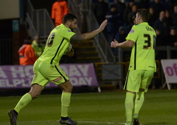 Billy Paynter celebrates his goal at Bristol Rovers