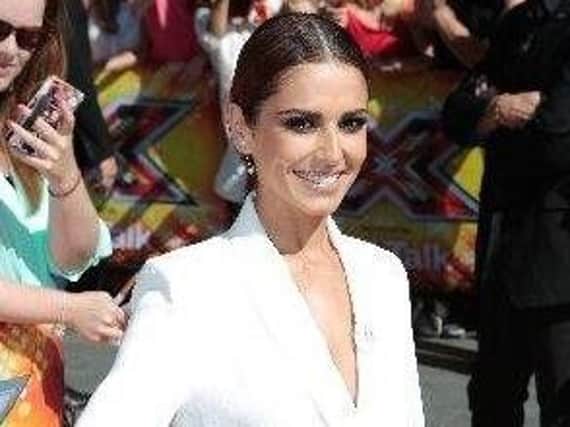 Cheryl Fernandez-Versini has fuelled rumours she's dating One Direction's Liam Payne.
