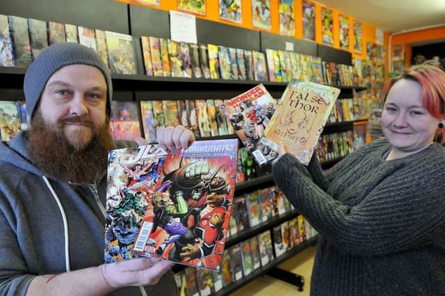 Kelvin Mills and Lyndsey Walton owners of Atomic Comics and Collectables. Picture by FRANK REID
