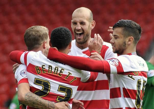 Rob Jones celebrates a goal for Doncaster Rovers