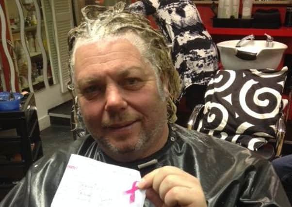 Neil Apedaile is raising money for cancer by getting his haired dyed in six different colours.